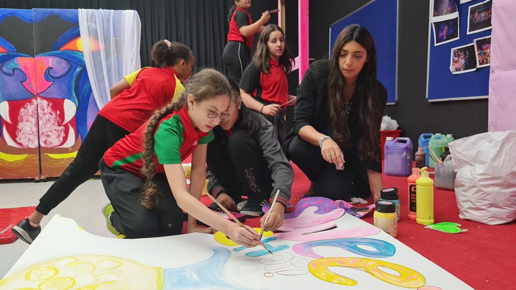 Students and teachers prepared event decorations for Al Salam Community School's breast cancer charity event, Bake Sale 2023.