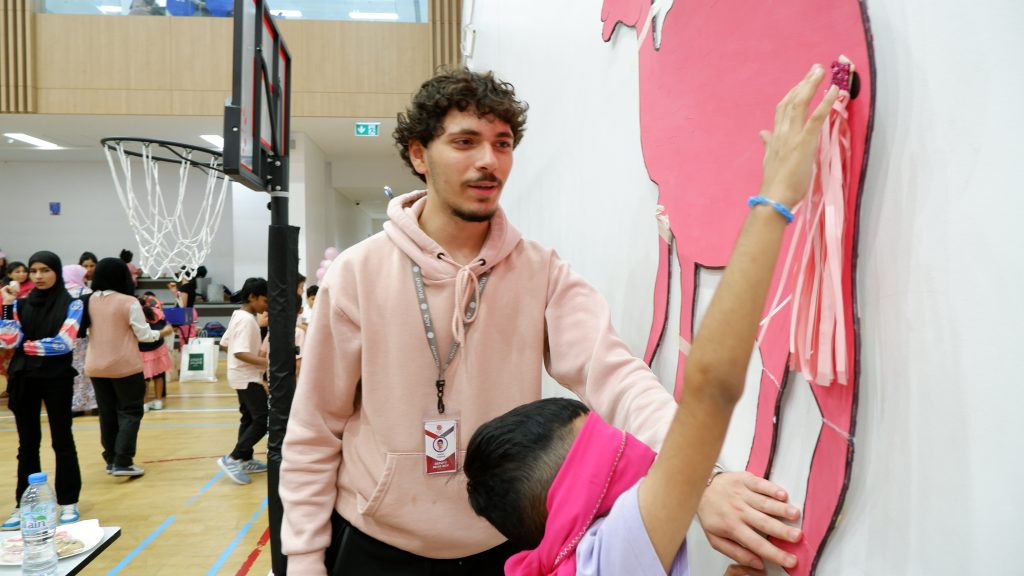 Student leaders hosted game stalls at Al Salam Community School's breast cancer charity event, Bake Sale 2023.