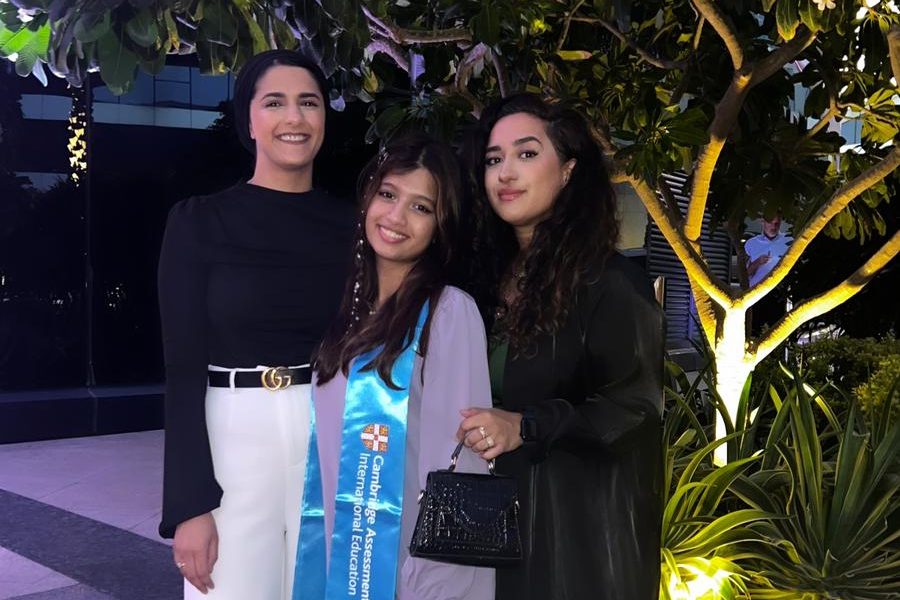 2023 Cambridge Learners Awardee, Haneen Ahmad, with her Sociology teachers. She surpassed all 59 UAE Cambridge schools.